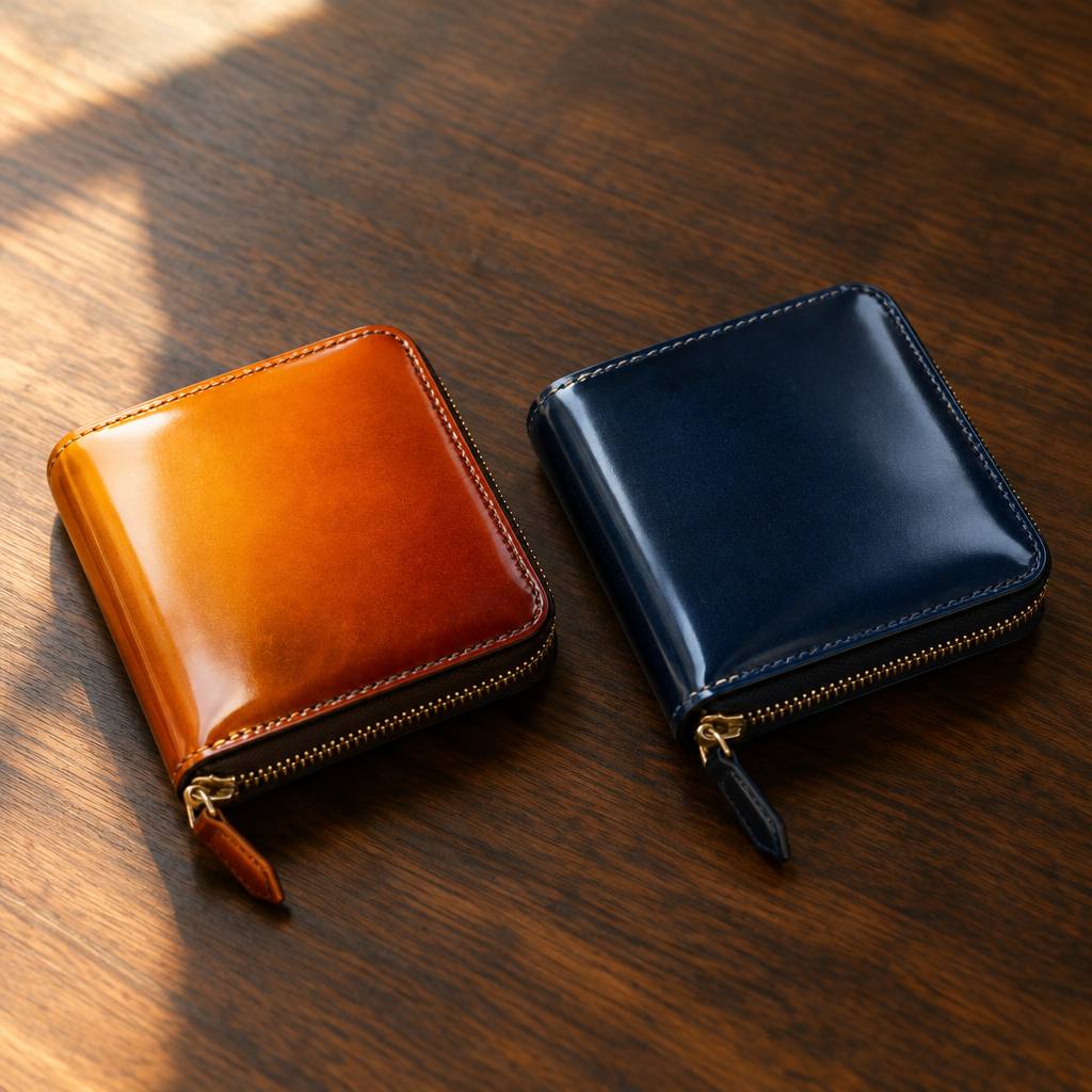 オレンジから琥珀色の2色染めと紺の単色のコードバン財布